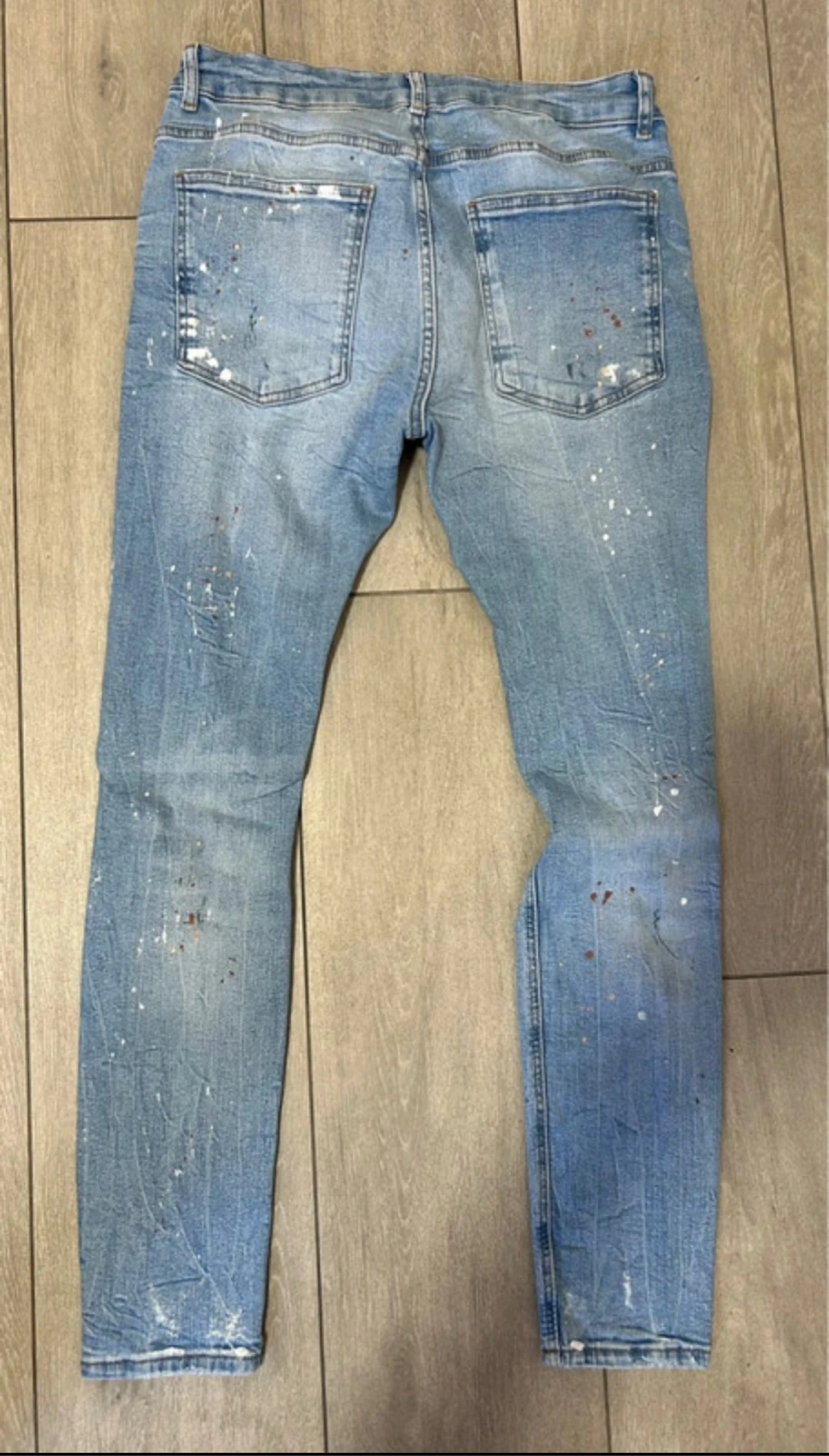 Calça jeans rasgada – photo 3